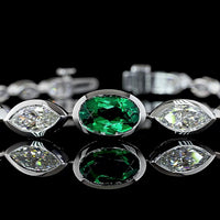 14K White Gold Riviera Bracelet with 1.83 Carats Oval Lab Emerald and Marquise Cut Lab Diamonds in Bezel Setting - 5.49 Total Carat Weight - Covaloro Fine Jewelry