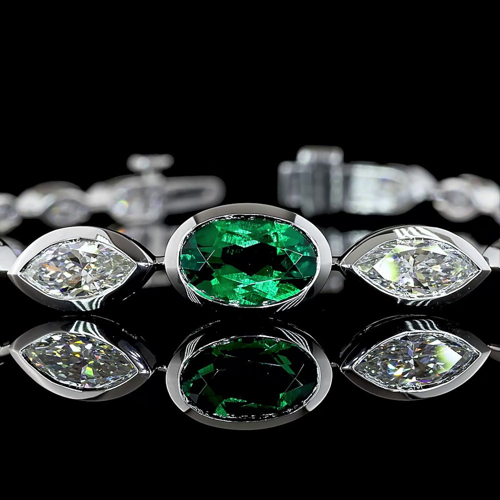 14K White Gold Riviera Bracelet with 1.83 Carats Oval Lab Emerald and Marquise Cut Lab Diamonds in Bezel Setting - 5.49 Total Carat Weight - Covaloro Fine Jewelry
