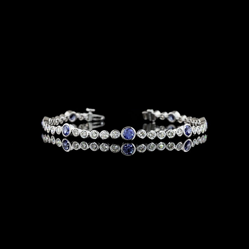 14K White Gold Riviera Bracelet with 35 Bezel Set Round Brilliant Cut Lab Gemstones in Blue - 2.36 Carat Total Weight - Covaloro Fine Jewelry