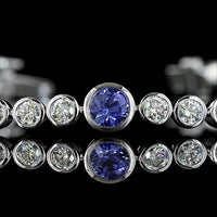 14K White Gold Riviera Bracelet with 35 Bezel Set Round Brilliant Cut Lab Gemstones in Blue - 2.36 Carat Total Weight - Covaloro Fine Jewelry