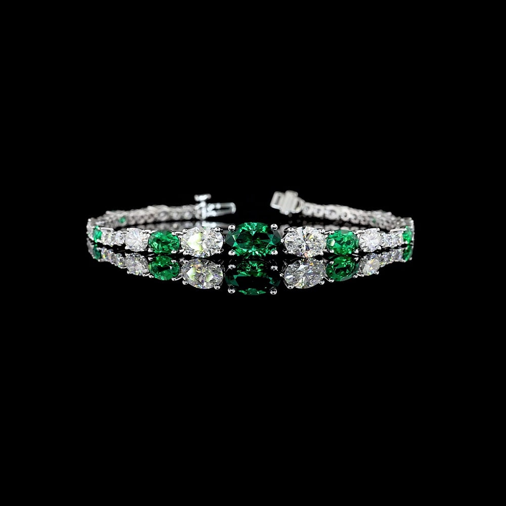 14K White Gold Riviera Bracelet with Alternating Oval Cut Lab-Grown Emerald and Diamond Accents - 5.92 Total Carat Weight - Covaloro Fine Jewelry
