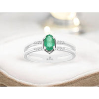 14K White Gold Split Shank Ring with Oval Emerald and Round Diamond Accents - 0.45 Carat Emerald, 0.04 Carat Diamond Total Weight - Royal Jewelry