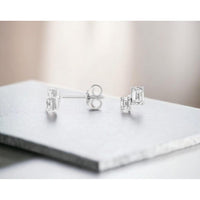 14K White Gold Staggered Emerald-Cut Diamond Stud Earrings - 0.63 Carat Total Diamond Weight - Royal Jewelry