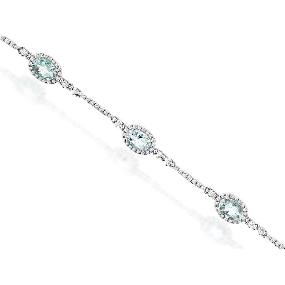 14K White Gold Station Bracelet with Halo-Set Oval Aquamarines and Round Diamonds - 3.00 Carat Total Aquamarine Weight and 0.90 Carat Total Diamond Weight - Royal Jewelry