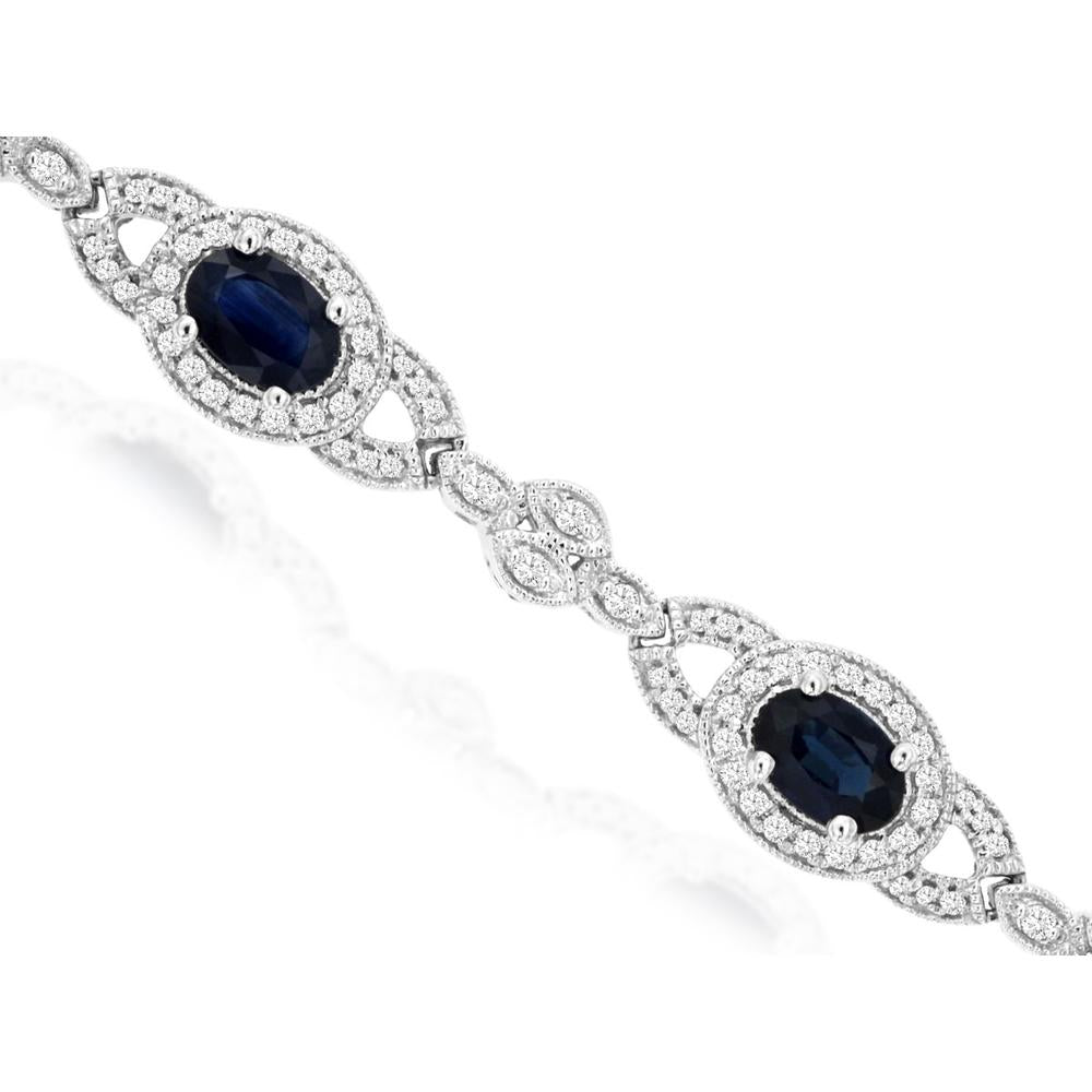 14K White Gold Station Bracelet with Oval Cut Blue Sapphires and Diamond Halo - 4.50 Carat Sapphire Total Weight, 1.08 Carat Diamond Total Weight - Royal Jewelry