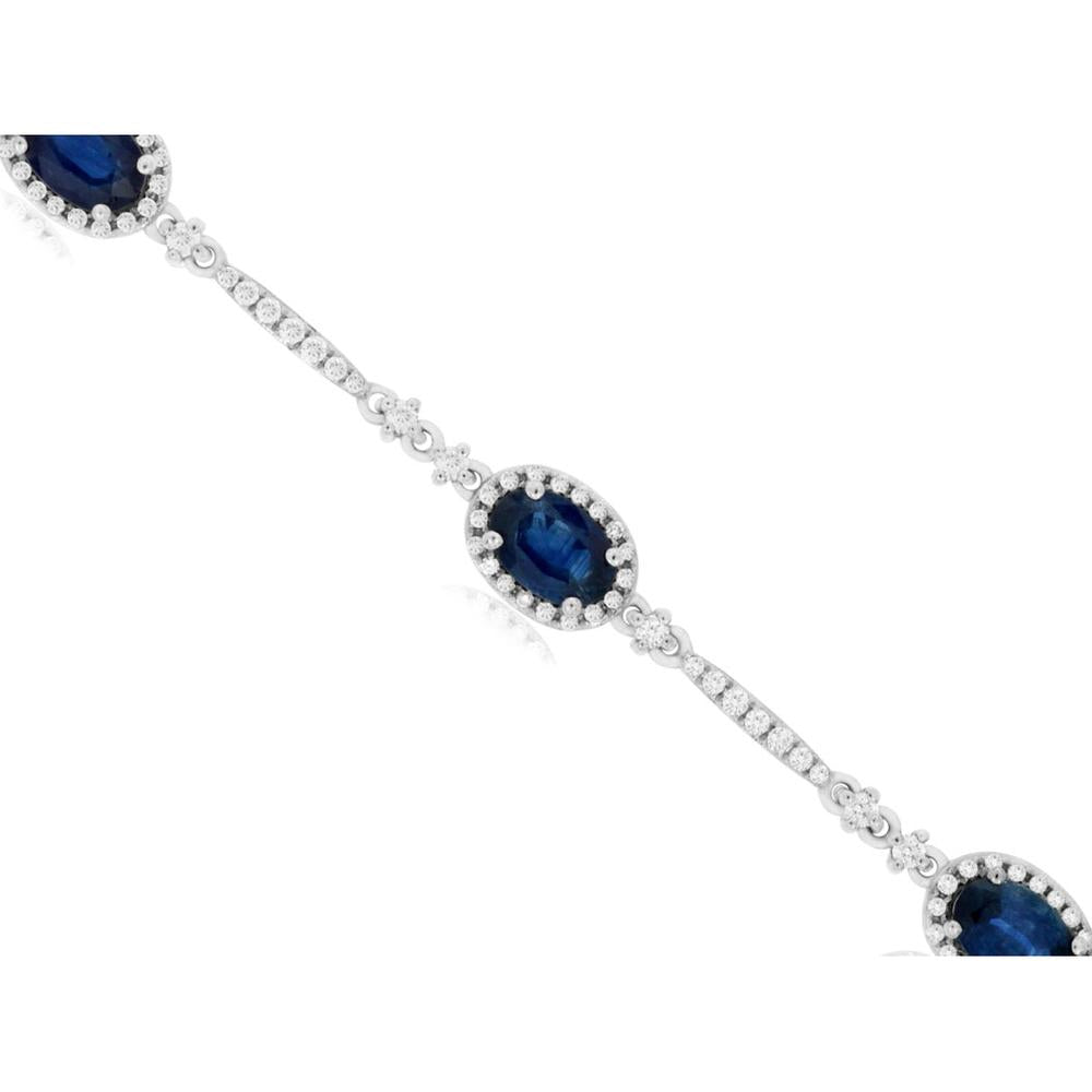 14K White Gold Station Bracelet with Oval Sapphires and Diamond Halos - 4.30 Carat Total Sapphire Weight, 0.90 Carat Total Diamond Weight - Royal Jewelry
