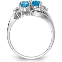 14K White Gold Swirl Ring with 6x4mm Oval Swiss Blue Topaz and Diamond Accents - 1.15 Carat Total Gem Weight by Monteluci Fine Jewelry
