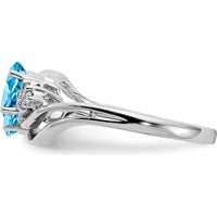 14K White Gold Swirl Ring with 6x4mm Oval Swiss Blue Topaz and Diamond Accents - 1.15 Carat Total Gem Weight by Monteluci Fine Jewelry