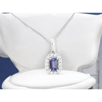 14K White Gold Tanzanite and Diamond Halo Pendant with Emerald-Cut Tanzanite - 0.32 Carat Tanzanite and 0.10 Carat Total Diamond Weight - Royal Jewelry