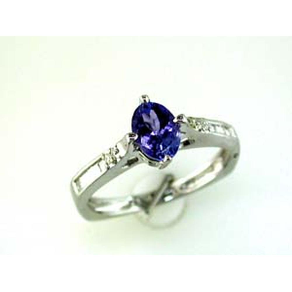 14K White Gold Tanzanite Oval & Diamond Baguette Ring - 0.93 Carats Total Gem Weight