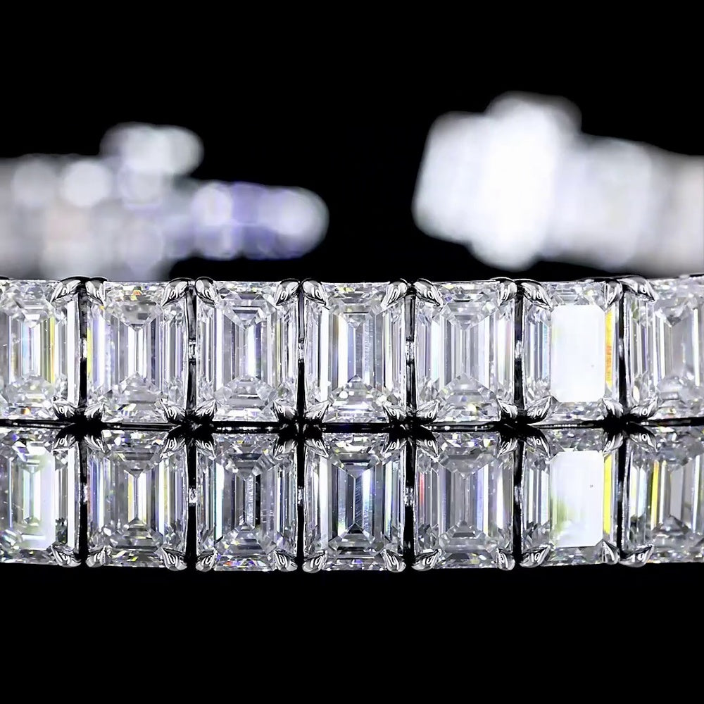 14K White Gold Tennis Bracelet with 12.45 Carats of Prong-Set Emerald Cut Lab Diamonds (E-F Color, VS Clarity) - 56 Pieces - Covaloro Fine Jewelry