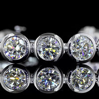 14K White Gold Tennis Bracelet with 23 Bezel-Set Round Lab Diamonds - 20.13 Carat Total Weight, E-F Color, VS Clarity - Covaloro Fine Jewelry