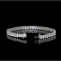 14K White Gold Tennis Bracelet with 49 Oval Cut Lab-Grown Diamonds - 10.49 Carat Total Weight, E-F Color VS2 Clarity - Covaloro Fine Jewelry