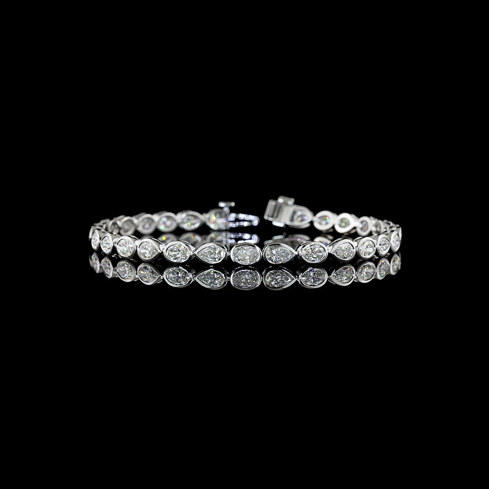 14K White Gold Tennis Bracelet with Alternating Oval and Pear Shaped Bezel-Set Lab Diamonds - 6.32 Carats Total Diamond Weight - Covaloro Fine Jewelry