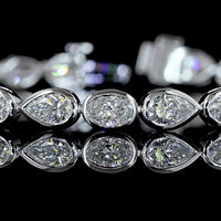 14K White Gold Tennis Bracelet with Alternating Oval and Pear Shaped Bezel-Set Lab Diamonds - 6.32 Carats Total Diamond Weight - Covaloro Fine Jewelry