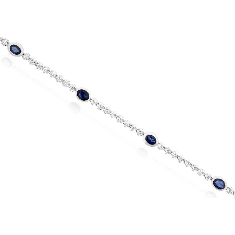 14K White Gold Tennis Bracelet with Bezel-Set Oval Sapphires and Round Diamonds - 1.80 Total Carat Weight (1.25 Carat Sapphire, 0.55 Carat Diamond) - Royal Jewelry