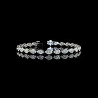 14K White Gold Tennis Bracelet with East-West Bezel Set Pear Shaped Lab Diamonds - 7.04 Carats Total Diamond Weight - Covaloro Fine Jewelry