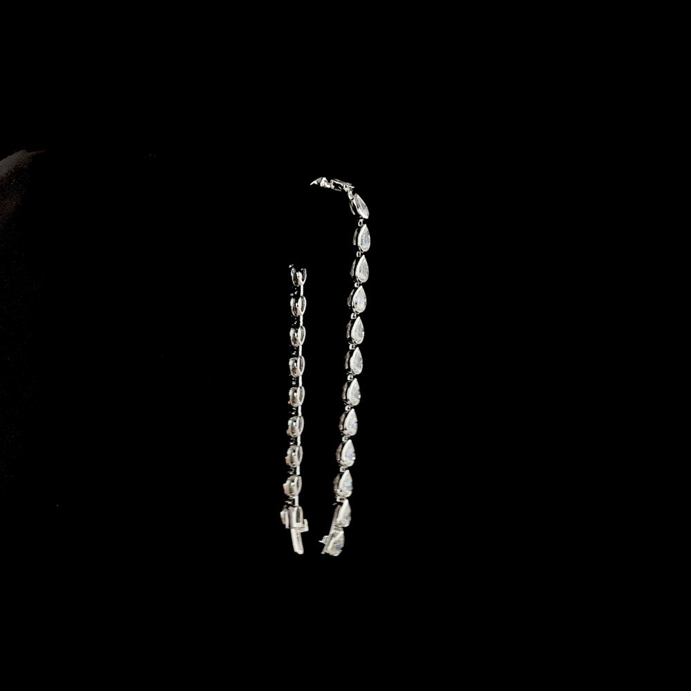 14K White Gold Tennis Bracelet with East-West Bezel Set Pear Shaped Lab Diamonds - 7.04 Carats Total Diamond Weight - Covaloro Fine Jewelry
