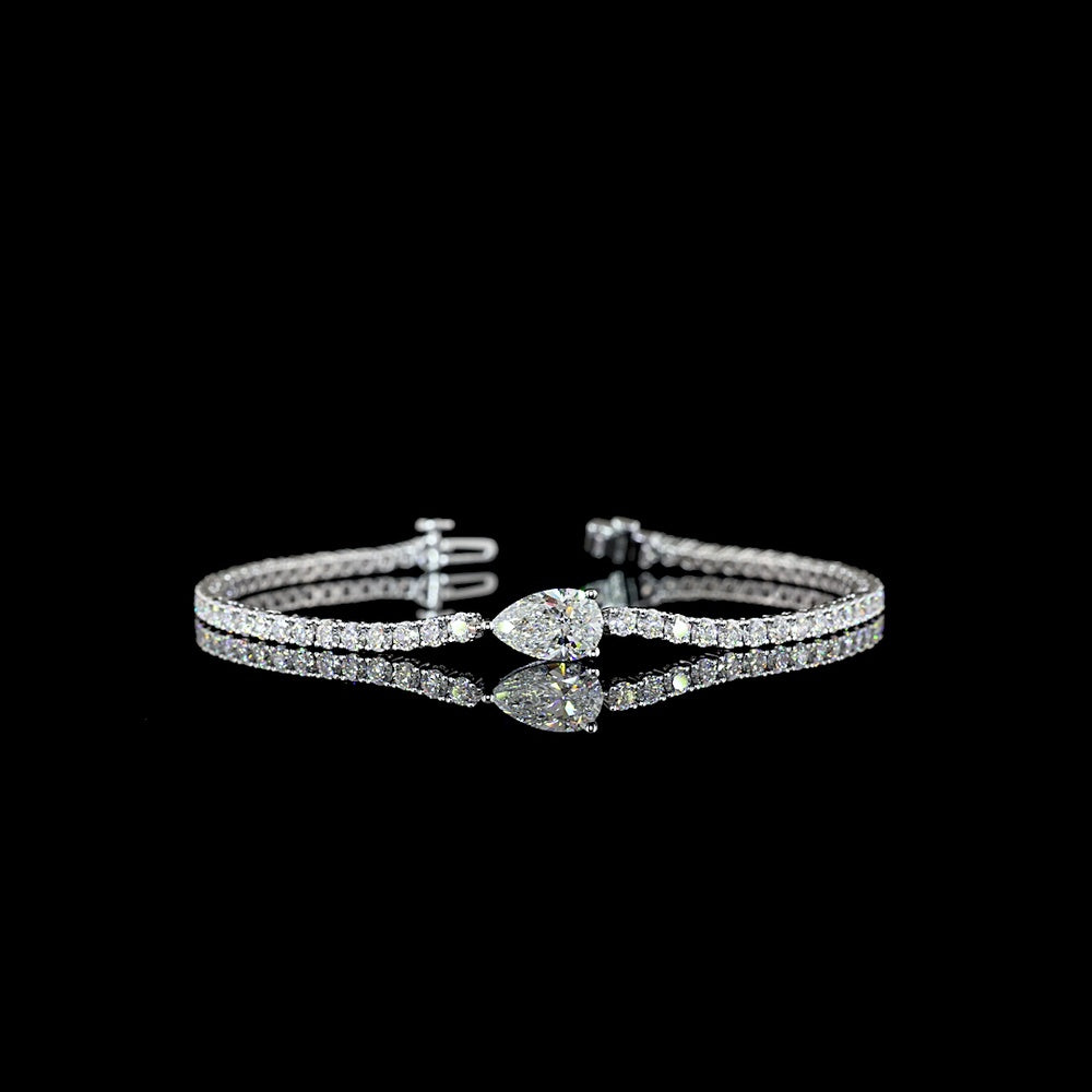 14K White Gold Tennis Bracelet with East-West Pear Shape Lab Diamond and 64 Round Brilliant Cut Lab Diamonds - 4.52 Carat Total Weight - Covaloro Fine Jewelry