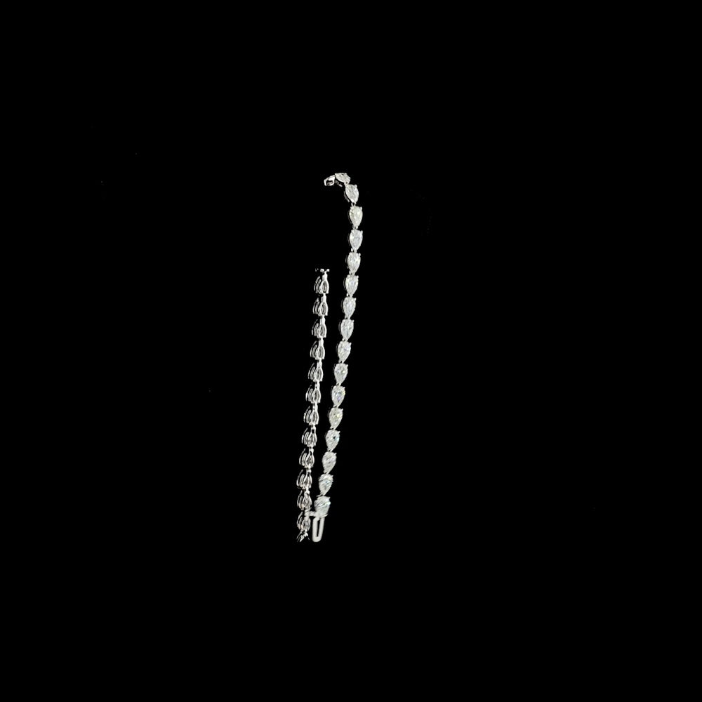 14K White Gold Tennis Bracelet with East-West Set Pear Shape Lab Diamonds - 6.10 Carat Total Weight, 35 Stones E-F Color VS1 Clarity - Covaloro Fine Jewelry