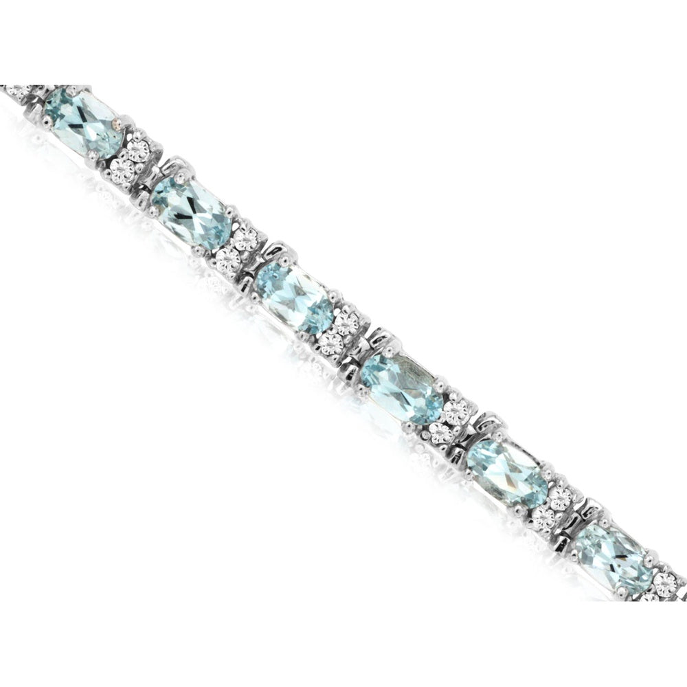 14K White Gold Tennis Bracelet with Oval Aquamarine and Diamond Cluster Stations - 5.10 Carat Total Aquamarine Weight - Royal Jewelry