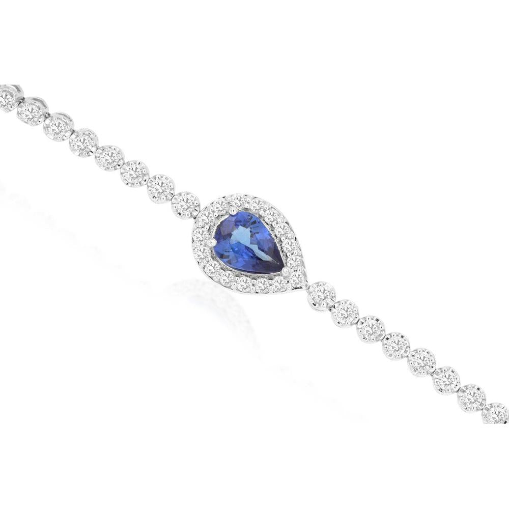14K White Gold Tennis Bracelet with Pear Shape Tanzanite Halo Center and Round Diamonds - 0.75 Carat Tanzanite and 1.50 Carat Total Diamond Weight - Royal Jewelry