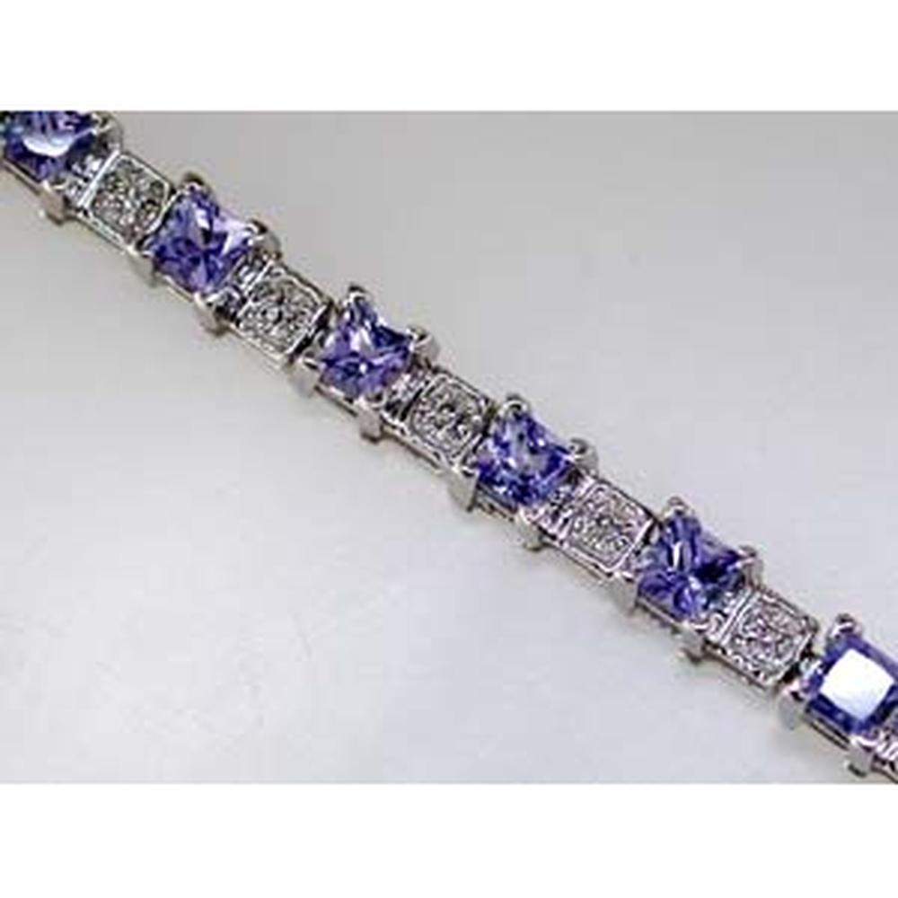 14K White Gold Tennis Bracelet with Princess Cut Tanzanite and Round Diamond Accents - 4.20 Carat Total Tanzanite Weight and 0.15 Carat Total Diamond Weight - Royal Jewelry