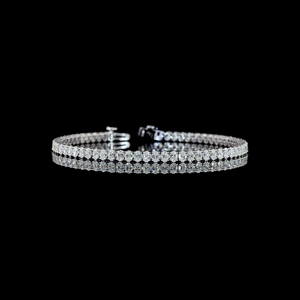 14K White Gold Tennis Bracelet with Prong-Set Oval Cut Natural Diamonds - 4.87 Carat Total Weight, E-F Color, VS+ Clarity - Covaloro Fine Jewelry