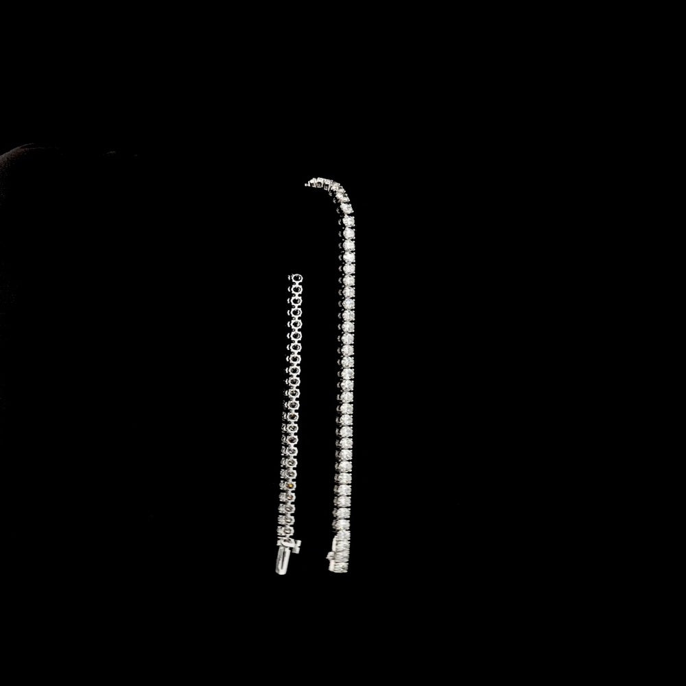 14K White Gold Tennis Bracelet with Prong-Set Oval Cut Natural Diamonds - 4.87 Carat Total Weight, E-F Color, VS+ Clarity - Covaloro Fine Jewelry