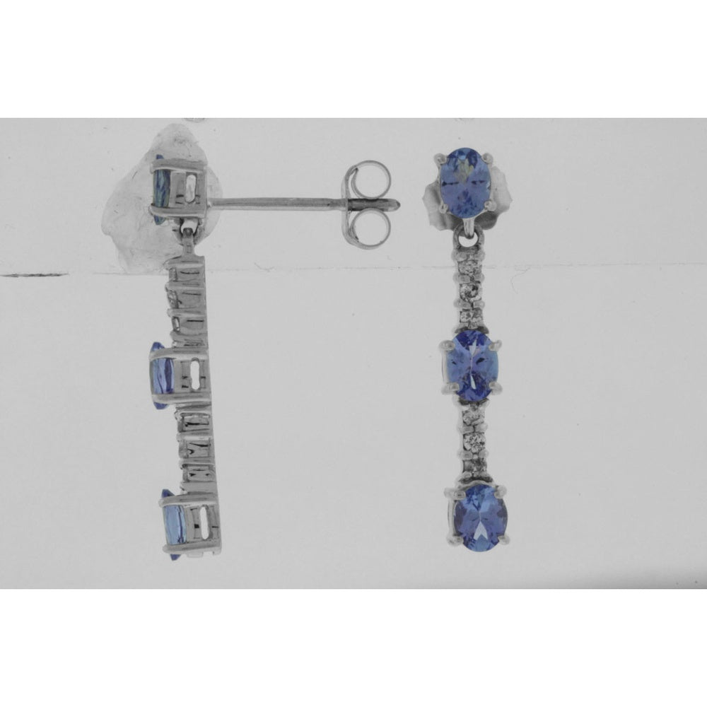 14K White Gold Three-Stone Drop Earrings with Oval Tanzanite and Round Diamond Accents - 1.10 Carat Total Tanzanite Weight and 0.12 Carat Total Diamond Weight - Royal Jewelry