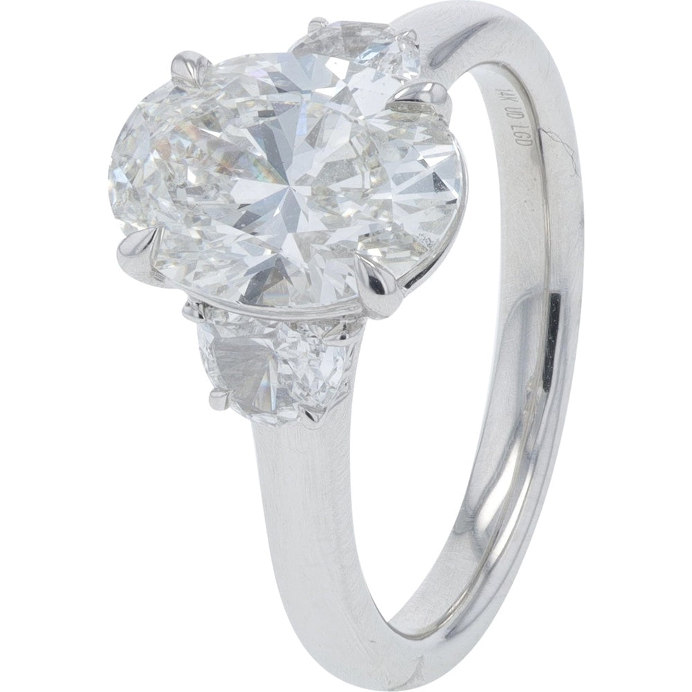 14K White Gold Three-Stone Engagement Ring with 2.50 Carat Oval Lab Grown Diamond and Accent Stones - 2.90 Carat Total Diamond Weight