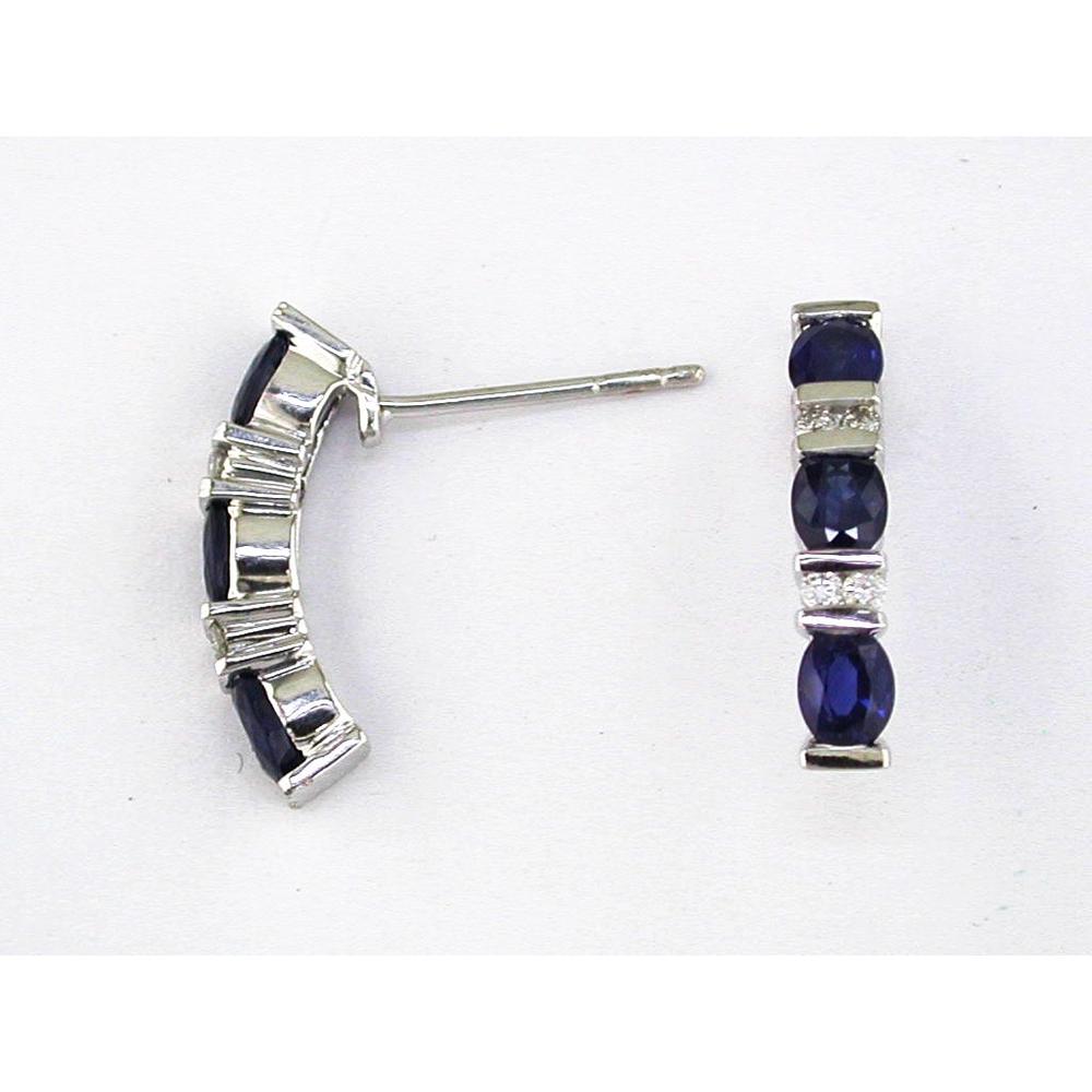 14K White Gold Three Stone Oval Sapphire and Round Diamond Earrings with Post Backs - 1.40 Carat Total Sapphire Weight and 0.10 Carat Total Diamond Weight - Royal Jewelry