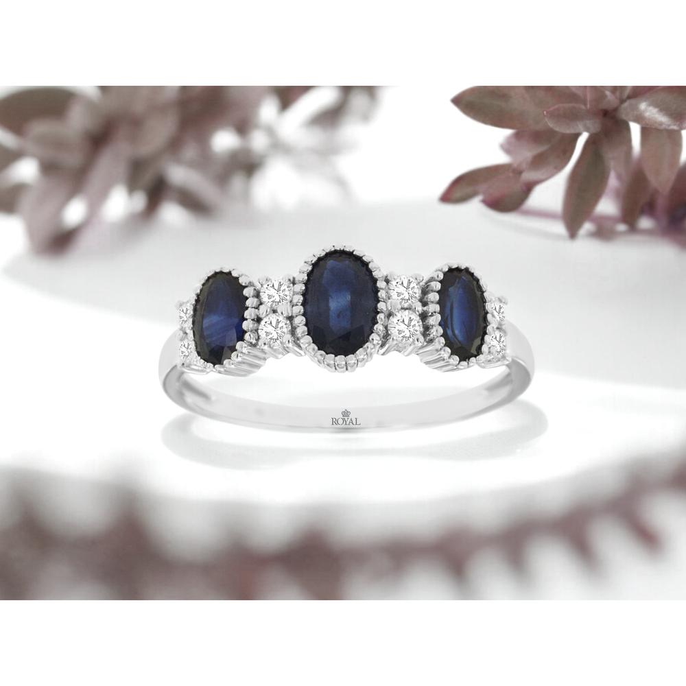 14K White Gold Three-Stone Oval Sapphire Ring with Milgrain Detail and Diamond Accents - 1.40 Carat Total Sapphire Weight, 0.16 Carat Total Diamond Weight - Royal Jewelry