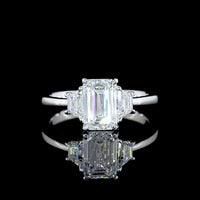 14K White Gold Three Stone Ring with 1.03 Carats Emerald Cut Lab Diamond and 0.40 Carats Trapezoid Cut Side Stones - 1.43 Carats Total Diamond Weight - Covaloro Fine Jewelry