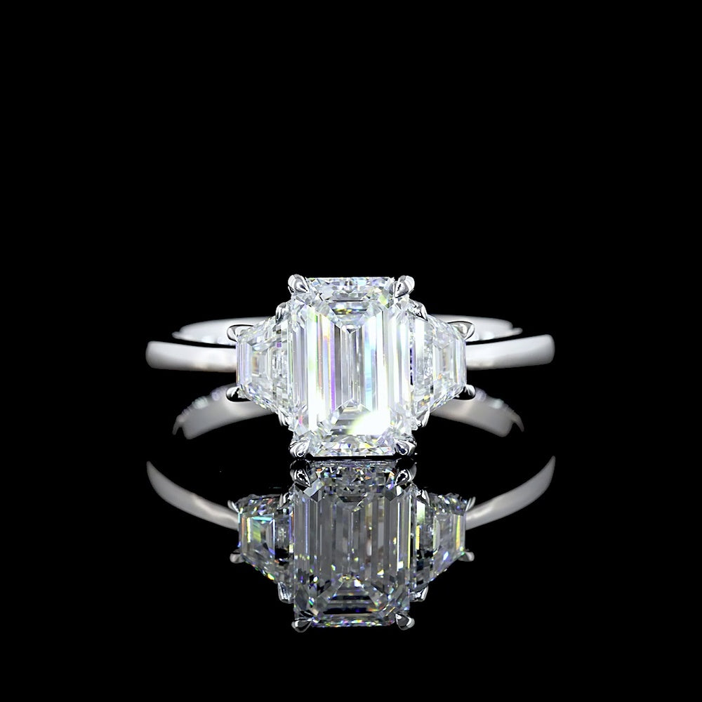 14K White Gold Three Stone Ring with 1.03 Carats Emerald Cut Lab Diamond and 0.40 Carats Trapezoid Cut Side Stones - 1.43 Carats Total Diamond Weight - Covaloro Fine Jewelry