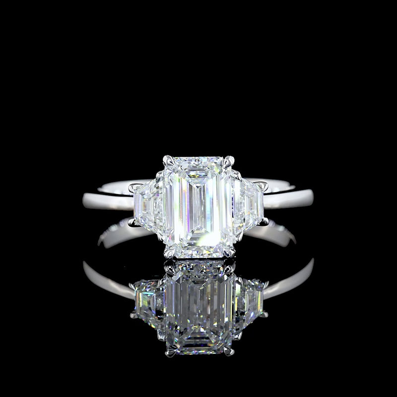 14K White Gold Three Stone Ring with 1.03 Carats Emerald Cut Lab Diamond and 0.40 Carats Trapezoid Cut Side Stones - 1.43 Carats Total Diamond Weight - Covaloro Fine Jewelry