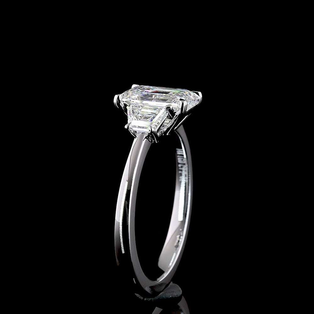 14K White Gold Three Stone Ring with 1.03 Carats Emerald Cut Lab Diamond and 0.40 Carats Trapezoid Cut Side Stones - 1.43 Carats Total Diamond Weight - Covaloro Fine Jewelry