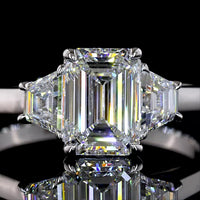 14K White Gold Three Stone Ring with 1.27 Carat Emerald Cut Lab Diamond and 0.50 Carat Trapezoid Side Stones - 1.77 Carat Total Diamond Weight D VVS1 IGI Certified - Covaloro Fine Jewelry