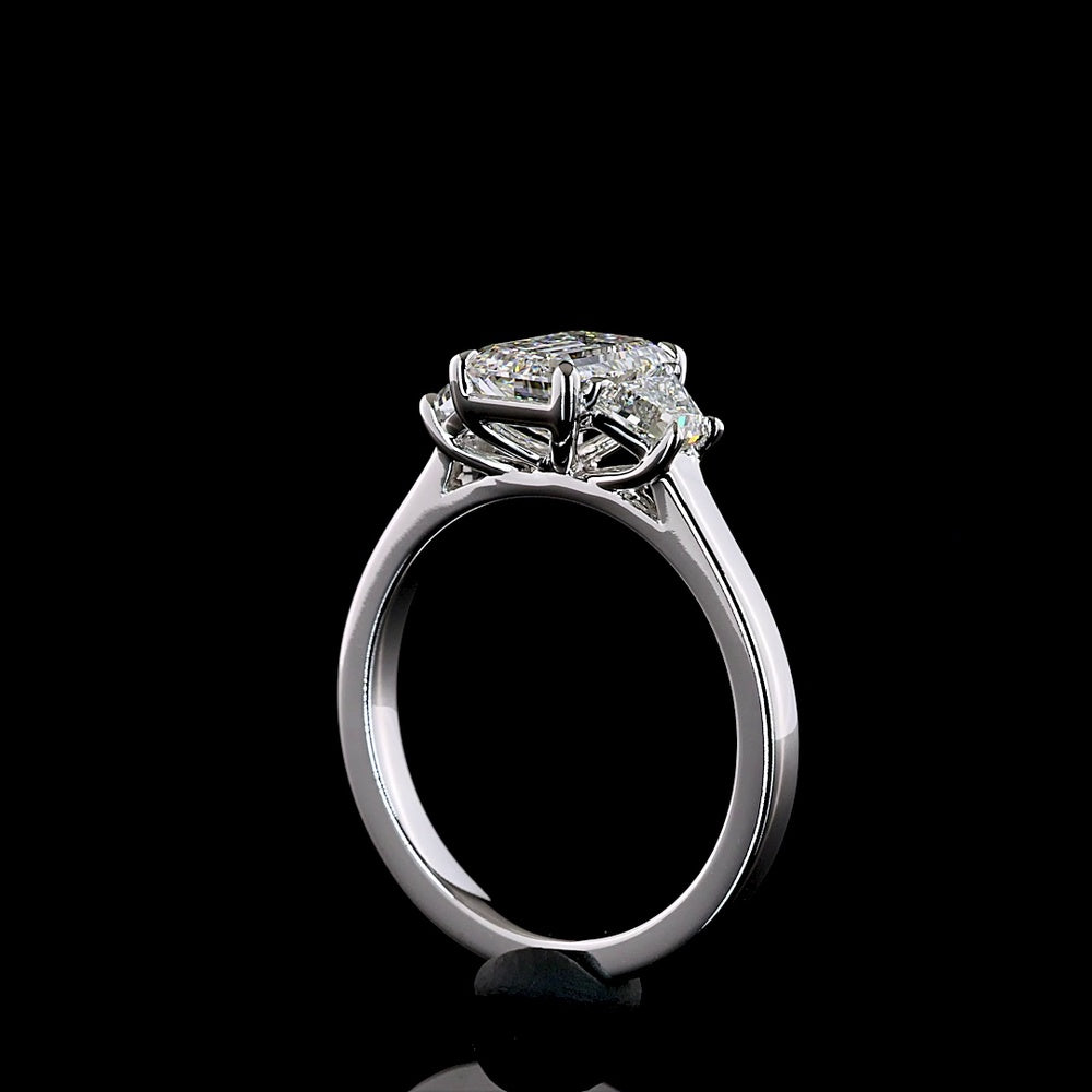 14K White Gold Three Stone Ring with 1.27 Carat Emerald Cut Lab Diamond and 0.50 Carat Trapezoid Side Stones - 1.77 Carat Total Diamond Weight D VVS1 IGI Certified - Covaloro Fine Jewelry