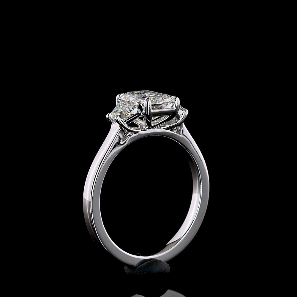 14K White Gold Three Stone Ring with 1.27 Carat Emerald Cut Lab Diamond and 0.50 Carat Trapezoid Side Stones - 1.77 Carat Total Diamond Weight D VVS1 IGI Certified - Covaloro Fine Jewelry