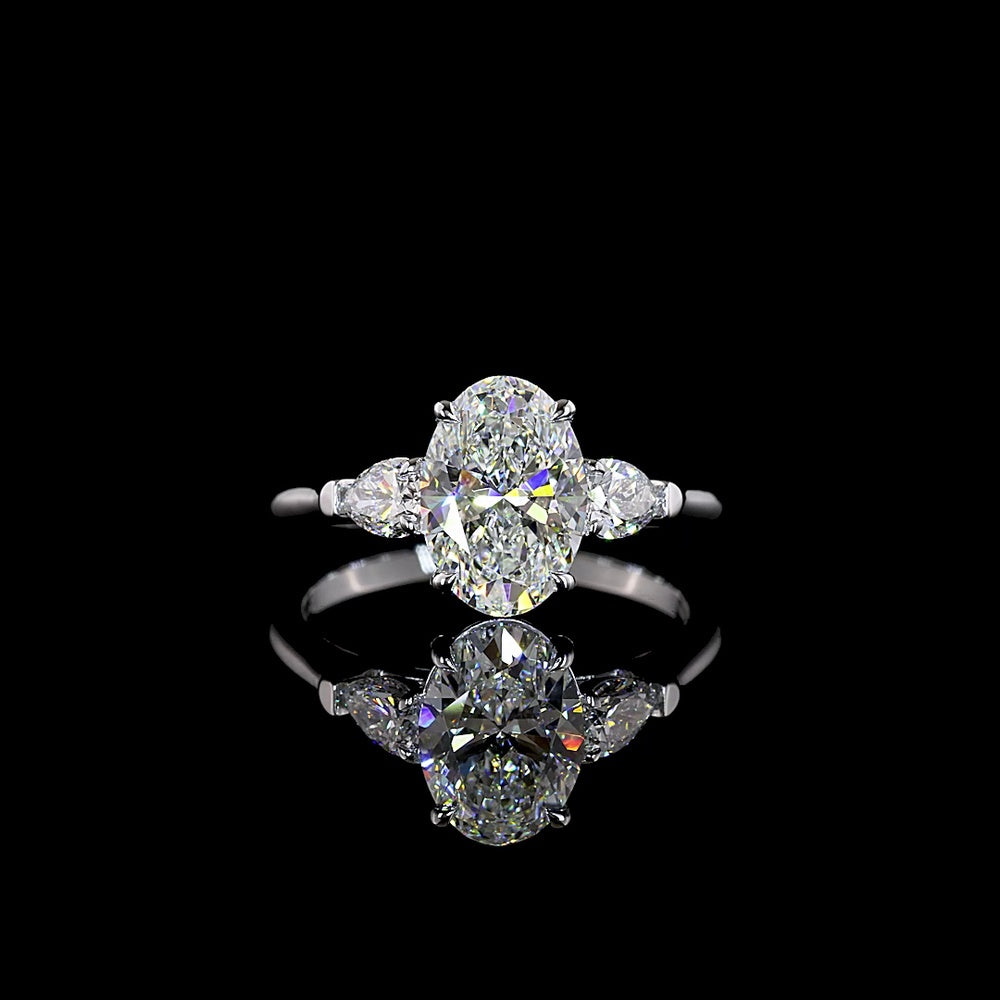 14K White Gold Three Stone Ring with 2.04 Carat Oval Lab Diamond and 0.47 Carat Pear Shape Side Stones - 2.51 Carat Total Diamond Weight - Covaloro Fine Jewelry