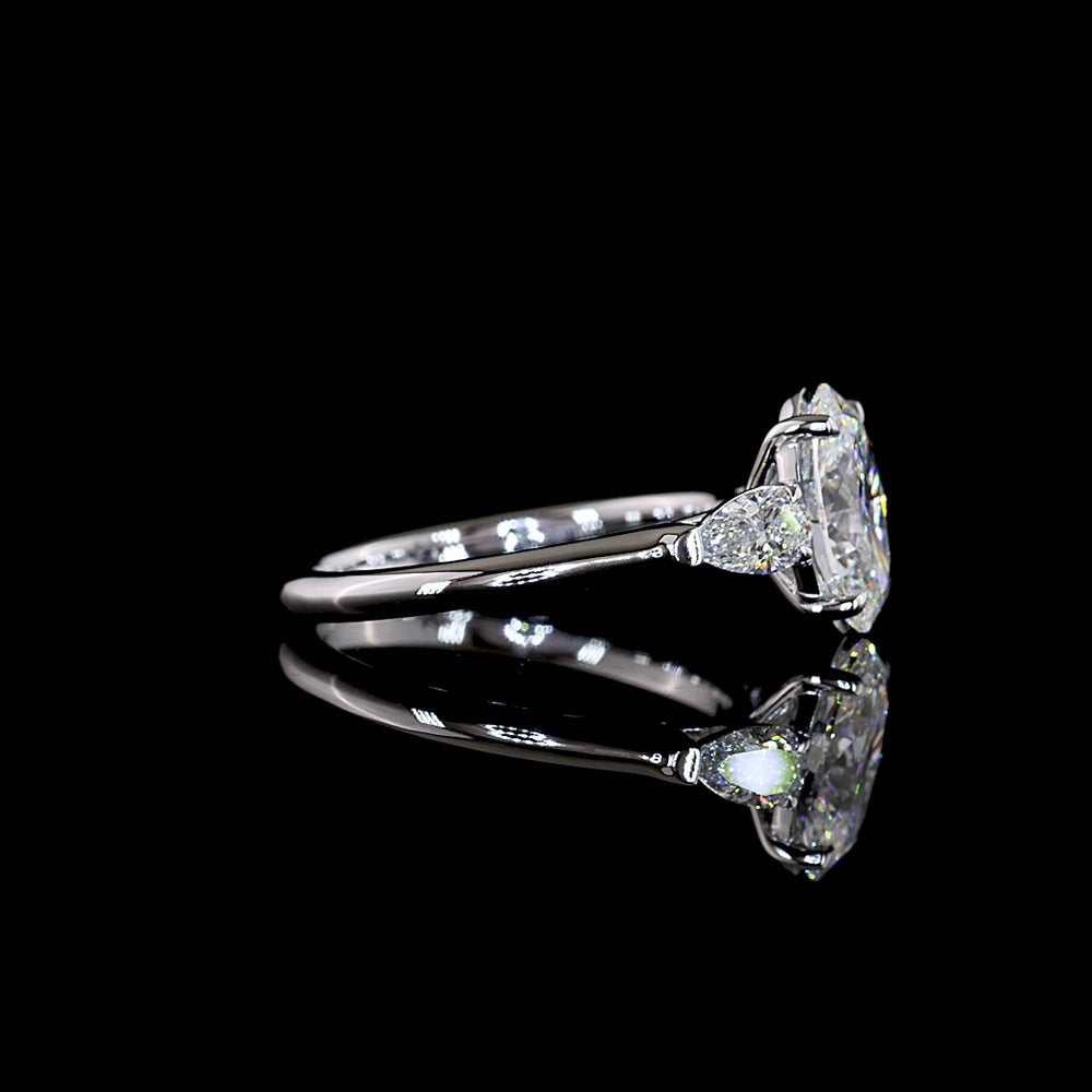 14K White Gold Three Stone Ring with 2.04 Carat Oval Lab Diamond and 0.47 Carat Pear Shape Side Stones - 2.51 Carat Total Diamond Weight - Covaloro Fine Jewelry