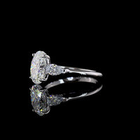 14K White Gold Three Stone Ring with 2.04 Carat Oval Lab Diamond and 0.47 Carat Pear Shape Side Stones - 2.51 Carat Total Diamond Weight - Covaloro Fine Jewelry