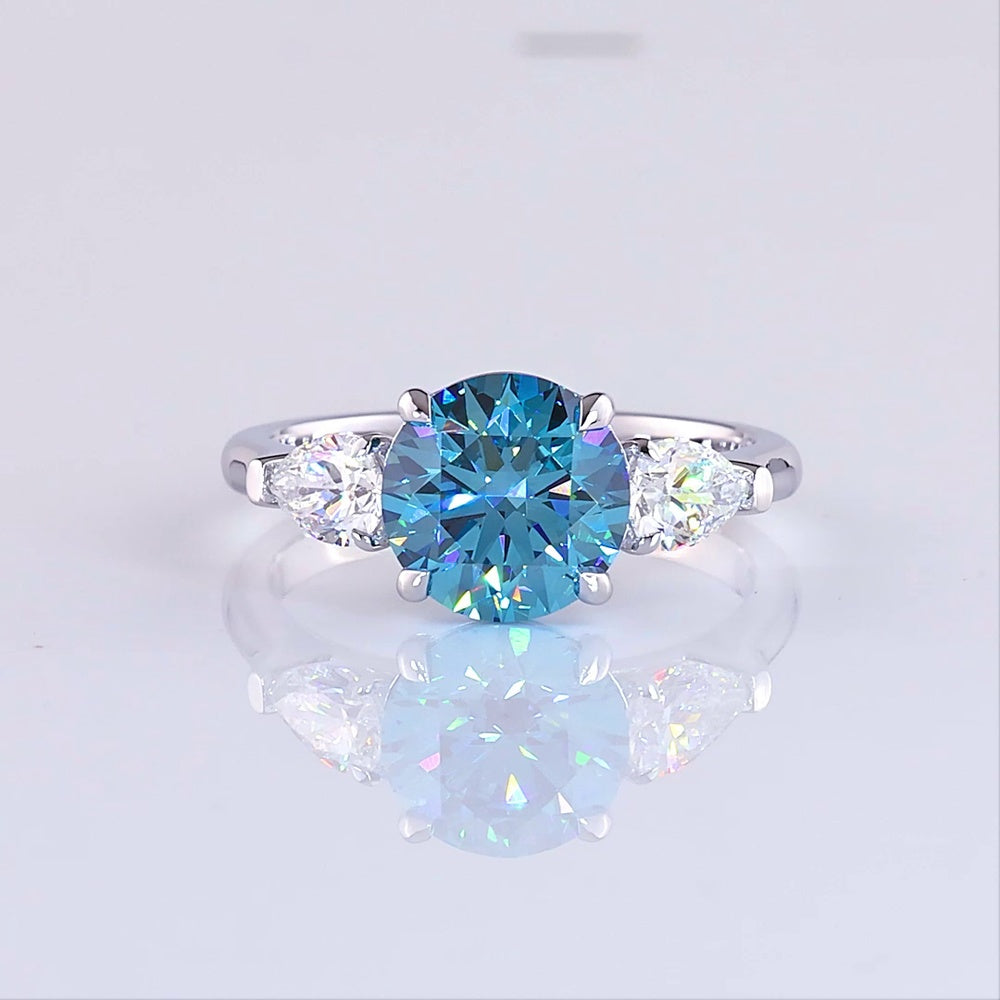 14K White Gold Three-Stone Ring with 2.28 Carat Round Fancy Vivid Blue Lab Diamond and 0.65 Carat Pear Shape White Diamonds - 2.93 Carat Total Weight - Covaloro Fine Jewelry