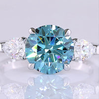 14K White Gold Three-Stone Ring with 2.28 Carat Round Fancy Vivid Blue Lab Diamond and 0.65 Carat Pear Shape White Diamonds - 2.93 Carat Total Weight - Covaloro Fine Jewelry