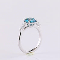 14K White Gold Three-Stone Ring with 2.28 Carat Round Fancy Vivid Blue Lab Diamond and 0.65 Carat Pear Shape White Diamonds - 2.93 Carat Total Weight - Covaloro Fine Jewelry