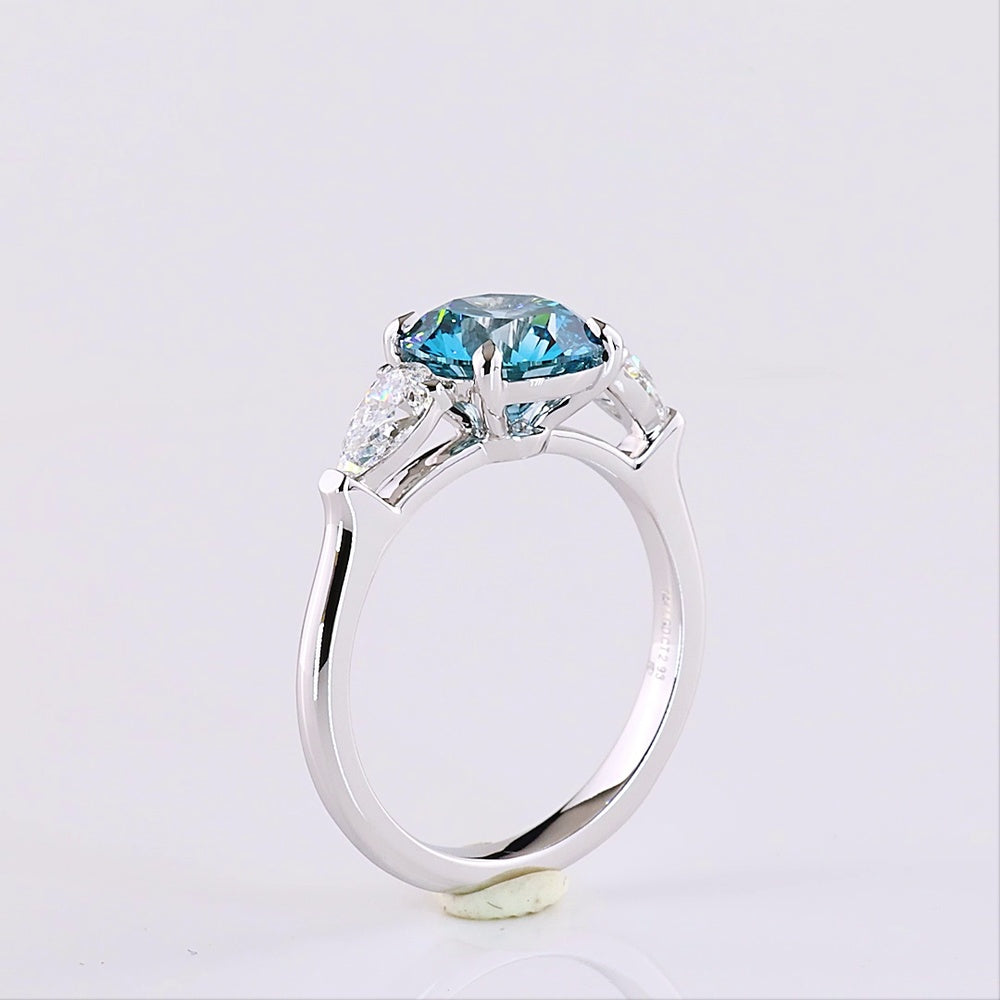 14K White Gold Three-Stone Ring with 2.28 Carat Round Fancy Vivid Blue Lab Diamond and 0.65 Carat Pear Shape White Diamonds - 2.93 Carat Total Weight - Covaloro Fine Jewelry