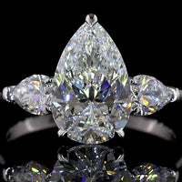 14K White Gold Three Stone Ring with 2.52 Carat Pear Shape Lab Diamond Center and Two Pear Side Diamonds - 3.19 Total Carat Weight - Covaloro Fine Jewelry