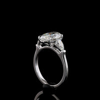 14K White Gold Three-Stone Ring with 2.69 Carat Oval Cut Lab Diamond and 0.66 Carat Pear Shaped Side Stones - IGI Certified E VVS2 - Covaloro Fine Jewelry