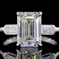 14K White Gold Three Stone Ring with 3.16 Carat Emerald Cut Lab Diamond and Baguette Side Stones - 3.77 Carat Total Diamond Weight - Covaloro Fine Jewelry